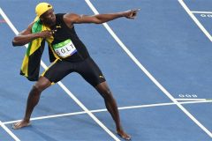 On top of the world: Usain Bolt wins the 100 meter final