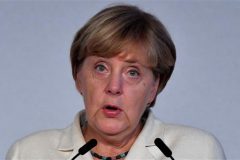 German Chancellor Merkel in hot water over refugee policy