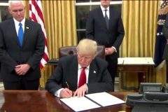 US President Donald Trump signs executive order on Obamacare