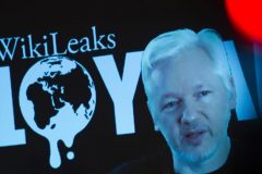 WikiLeaks founder says Obama attempting to delegitimize Trump