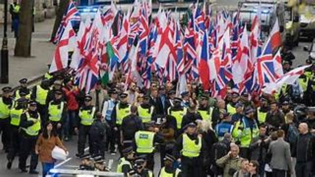 Thousands rally across UK against rise in far-right violence